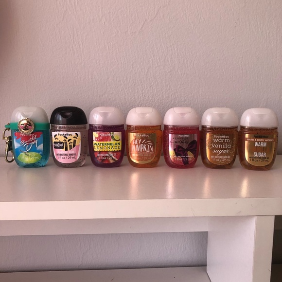 BATH & BODY WORKS POUCH, 7 NEW UNUSED HAND SANITIZERS, & LIGHT UP PARROT HOLDER - Picture 2 of 4